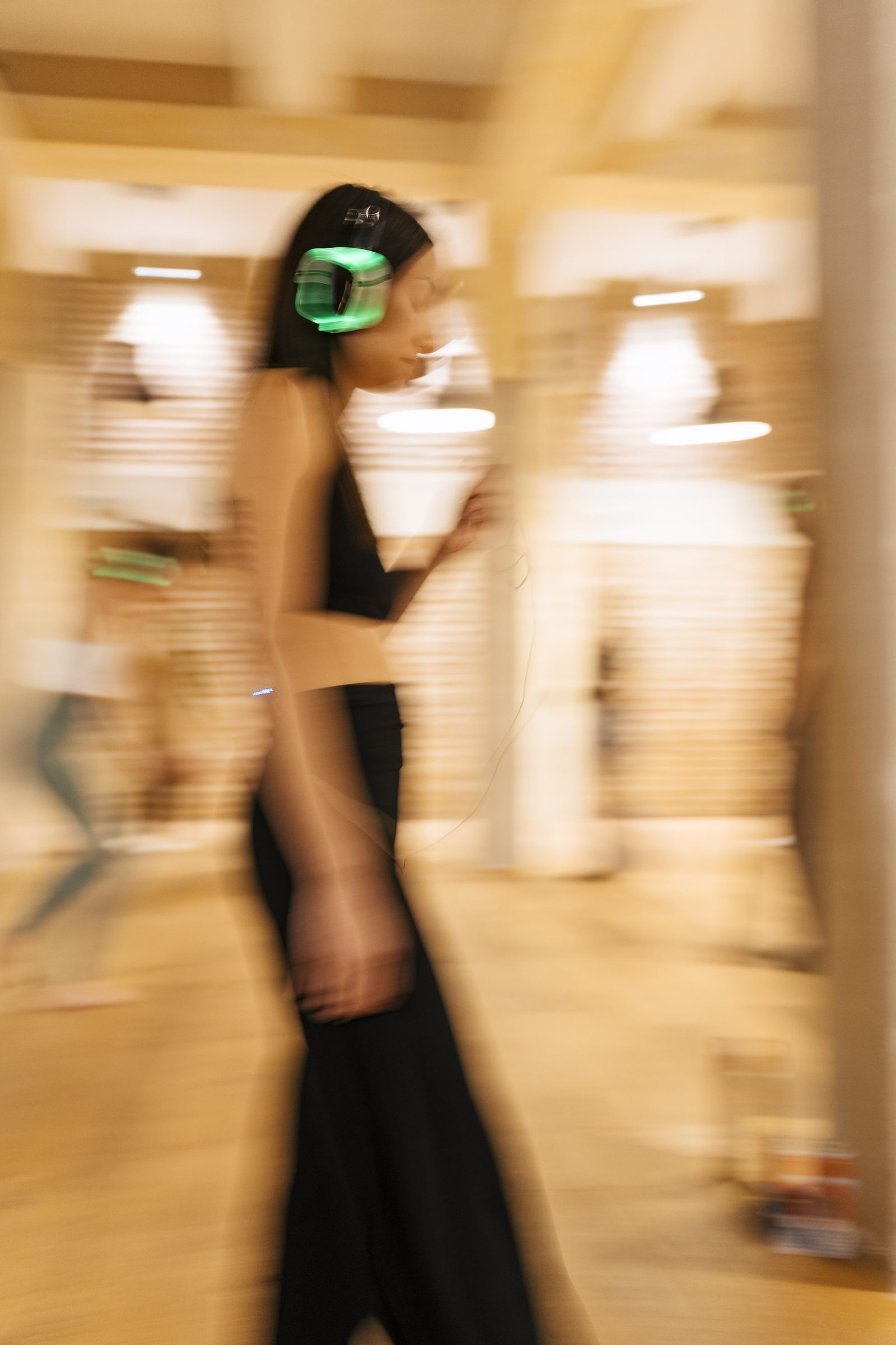 A dancer in motion blur, ecstatic movement at a Soul Rave